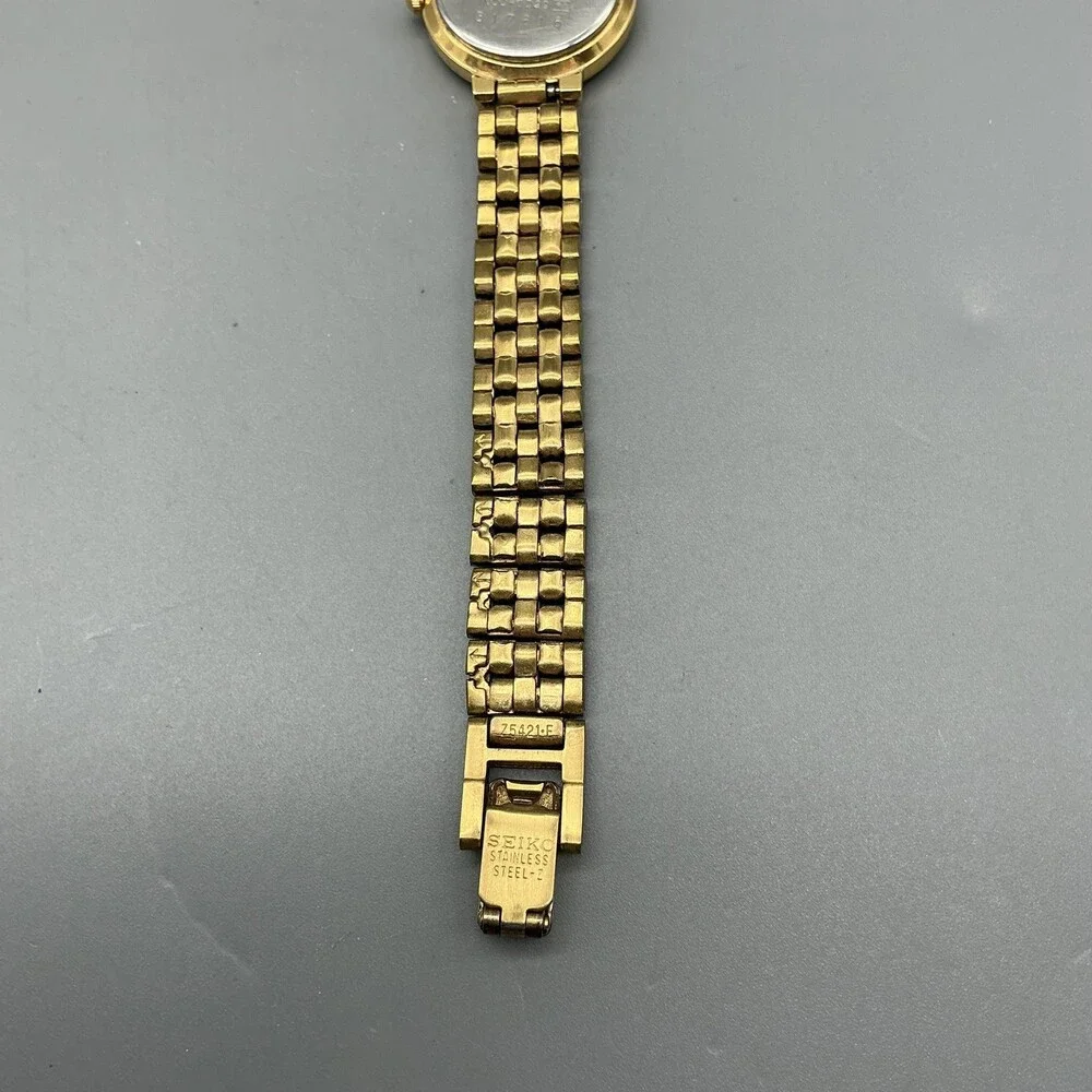 Vintage Seiko Womens Watch 21mm Black Dial Gold Tone 1N00-0D29 New Battery 6.5